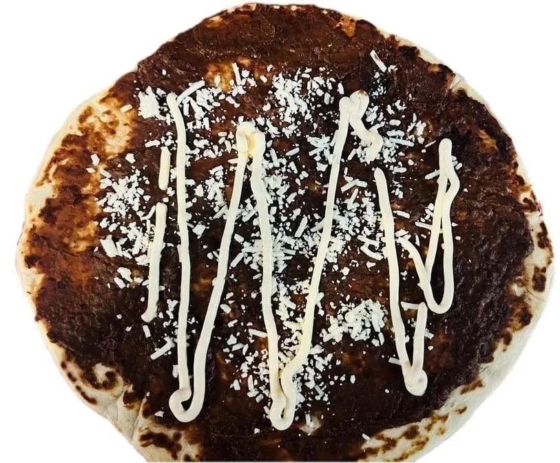 Baleadas Sencillas - Simple baleadas with refried beans, cheese, and cream.