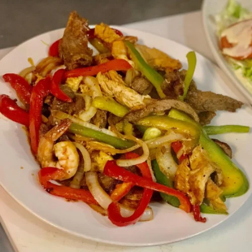 Beef Fajitas - Sizzling beef fajitas with peppers and onions.