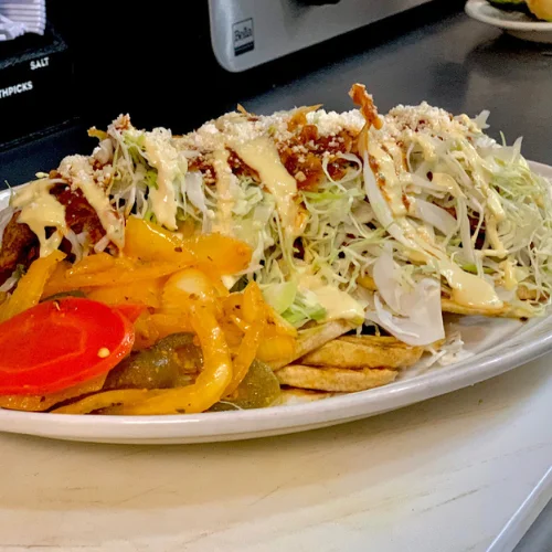 Chicken with Green Plantains - Fried chicken served with slices of green plantains.